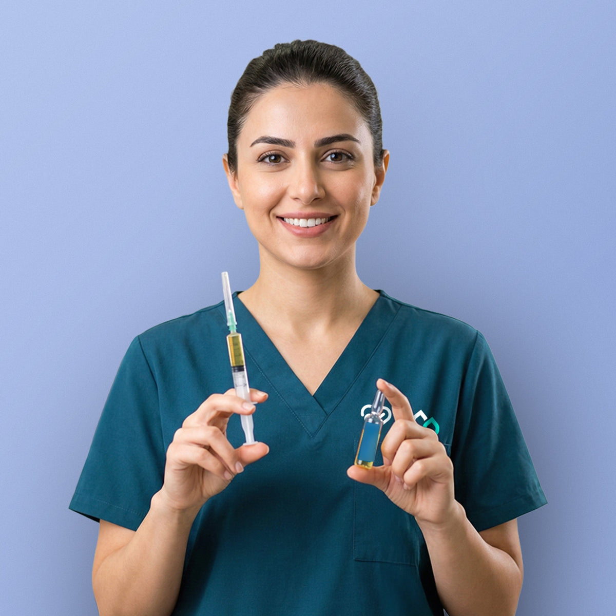 A nurse holds a syringe and a small vial